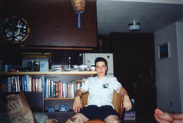 A person sitting in a chair

Description automatically generated