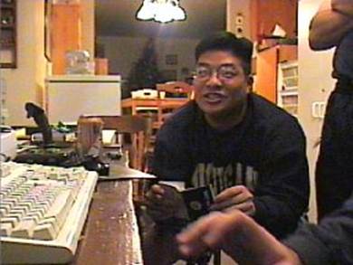 A person sitting at a table

Description automatically generated with medium confidence